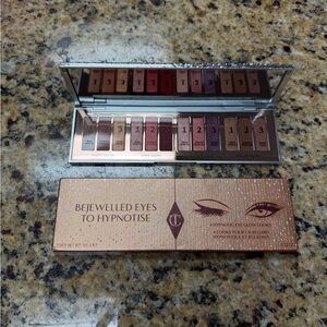 Charlotte Tilbury Hypnotic Eyeshadow Palette with Gold and Purple Hues
